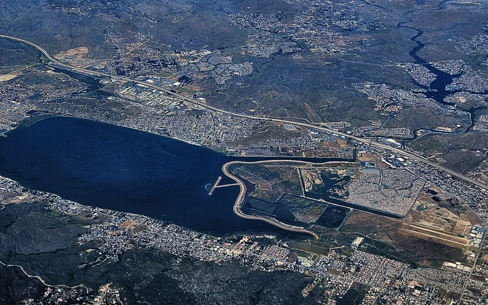 Aerial view of Lake Elsinore and its surrounding neighborhoods in California